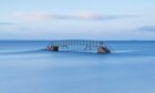 The beautiful Bridge To Nowhere at Belhaven Bay. Image: Kenny Lam, VisitScotland.