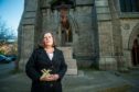 Aberdeen councillor Mrs Jennifer Stewart outside the St Mary's cathedral on Huntly Street. Image: Wullie Marr/DC Thomson