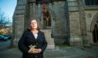Aberdeen councillor Mrs Jennifer Stewart outside the St Mary's cathedral on Huntly Street. Image: Wullie Marr/DC Thomson
