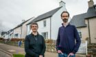 Maggie Chapman MSP, left and Chapelton resident Alastair Struthers, right, are asking for rules on where solar panels can be placed in the new town to be relaxed. Image: Wullie Marr / DC Thomson