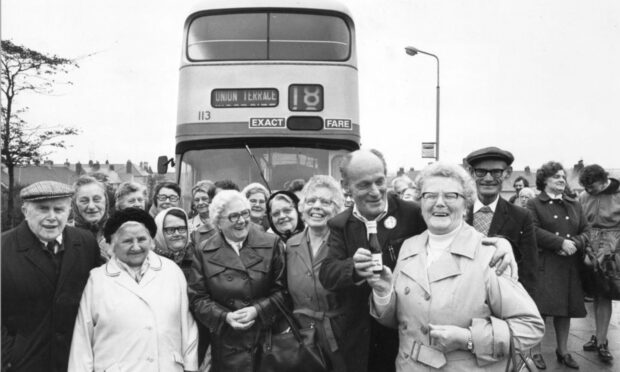 Jessie Mutch, 74, was presented with a Babycham to celebrate Middlefield residents' successful campaign to have extra buses on the number 18 route to take shoppers to Aberdeen city centre in 1979. Image: DC Thomson