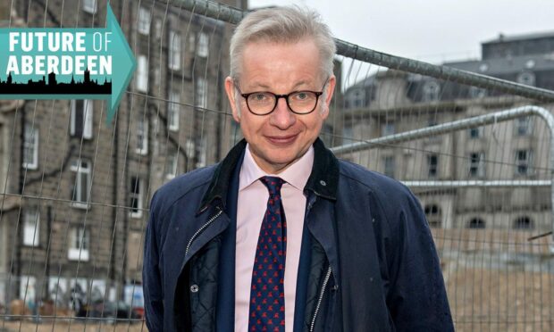 Levelling Up Secretary Michael Gove took in the rubble of the former BHS site in Aberdeen. Nearly 40 years ago, he stacked shelves there - and now he is tipping plans for a new market there to help Aberdeen's recovery. Image: Kath Flannery/DC Thomson