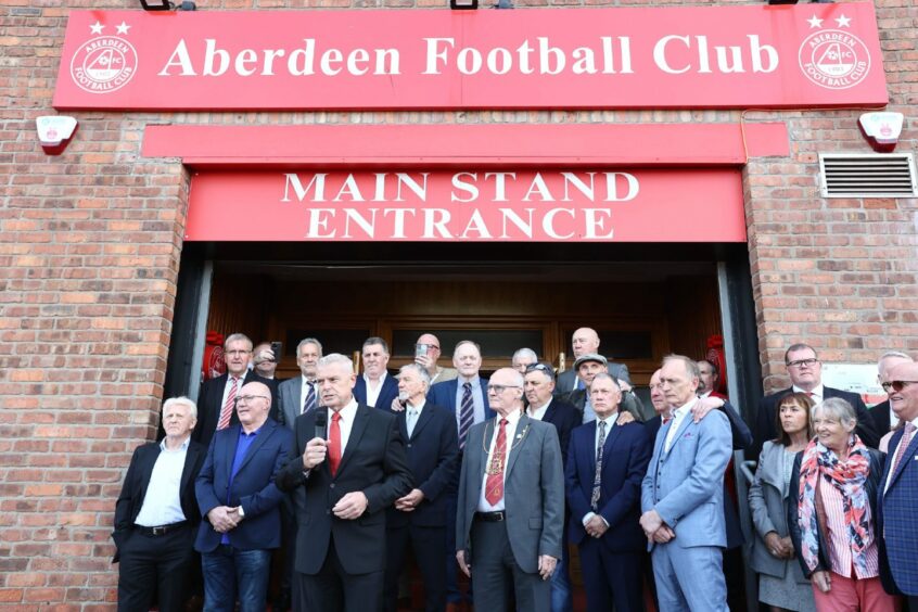 Aberdeen FC's Dave Cormack and the Gothenburg Greats at the entrance to Pittodrie.