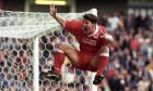 Aberdeen's Dean Windass celebrates a John Inglis goal against Rangers at Ibrox. Image: SNS.