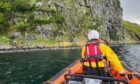 Kyle RNLI approach the location where the hillwalker was trapped. Image: Kyle RNLI