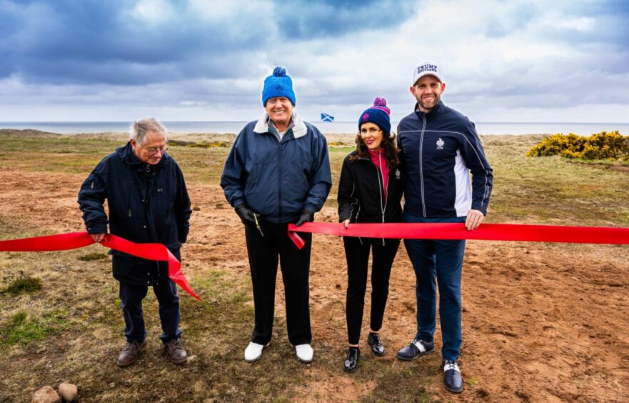 Donald Trump cutting the ribbon to break ground on the new MacLeod golf course at the Menie Estate in Balmedie, Aberdeen.