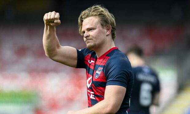 Alex Samuel celebrates scoring for Ross County against Livingston. Image: SNS