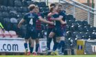 Ross County celebrate Jordan White's third goal against Dundee United. Image: SNS