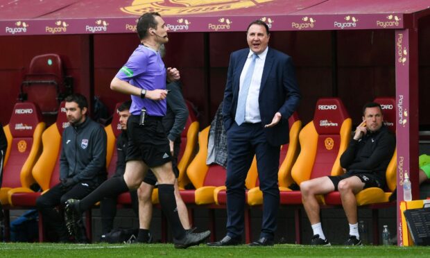 Ross County manager Malky Mackay questions referee Euan Anderson at Fir Park. Image: SNS