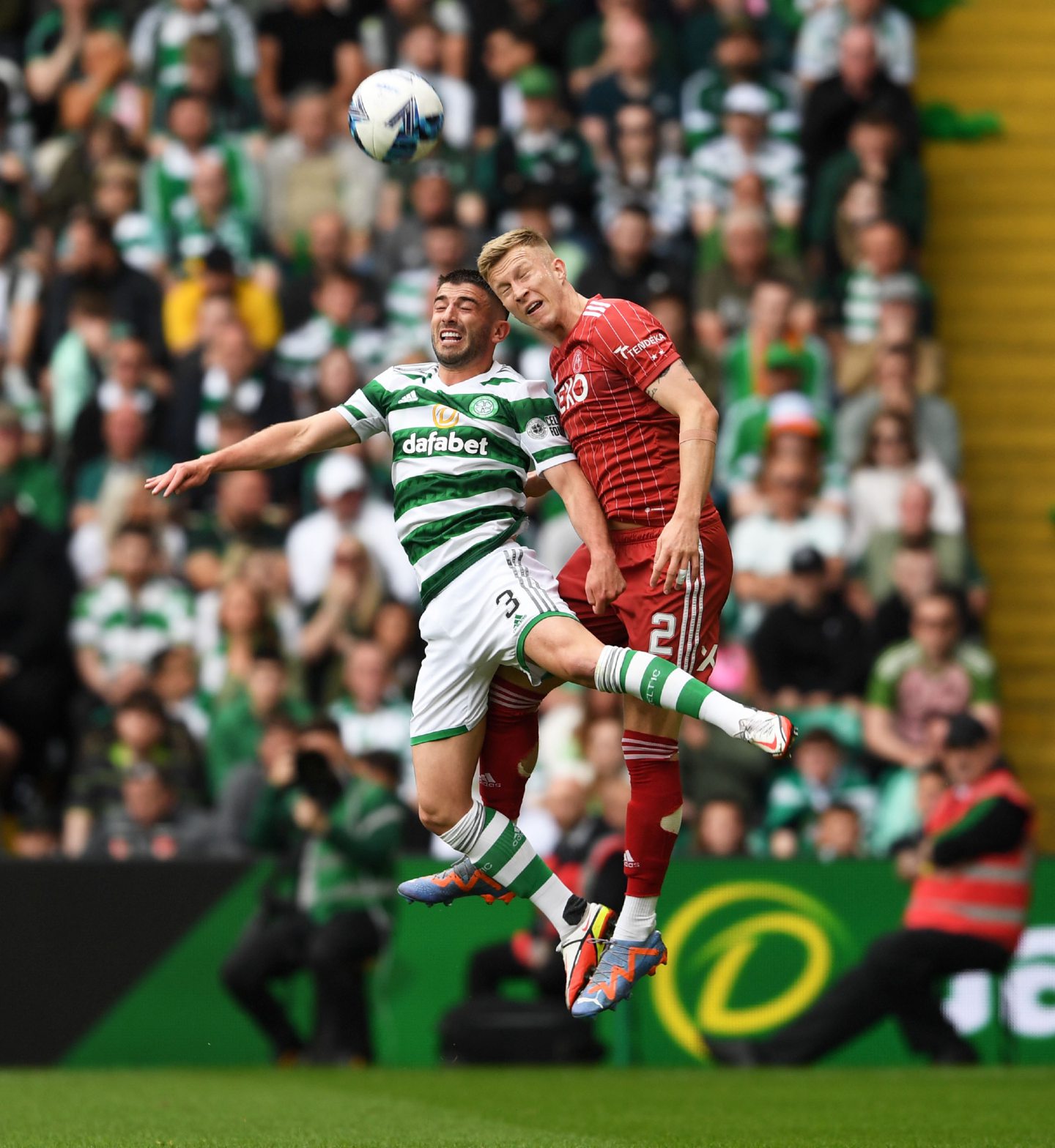 Greg Taylor and Ross McCrorie both aiming to header the ball during the Aberdeen v Celtic game
