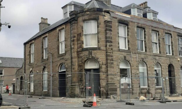 The former Clydesdale Bank branch building has closed off due to falling masonry last week. Image: Billy Brock