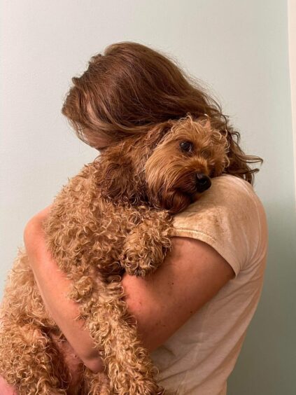 Dasha Samatoina hugs Bear 