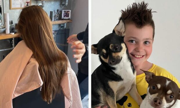 Nine-year-old Nairn dog lover has had a haircut to fundraise for the Dogs Trust. Pictured with pets Buddy and Ralphie. Image: Dogs Trust.