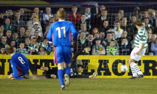 Dennis Wyness slides in to score the only goal as Inverness beat Celtic 1-0 in the Scottish Cup quarter-final in 2003. Image: SNS