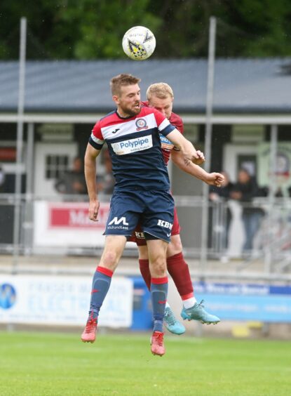 Ewan Clark in action for Turriff United