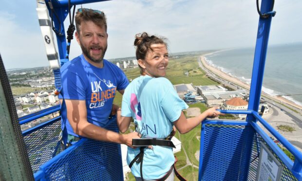 Are you brave enough to take on the bungee jump challenge? Pictured is one of the participants of the 2019 event. Image: Clan Cancer Support.