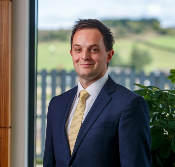 Headshot of Acumen's Chris Hewson who advises owners on financial planning for their businesses