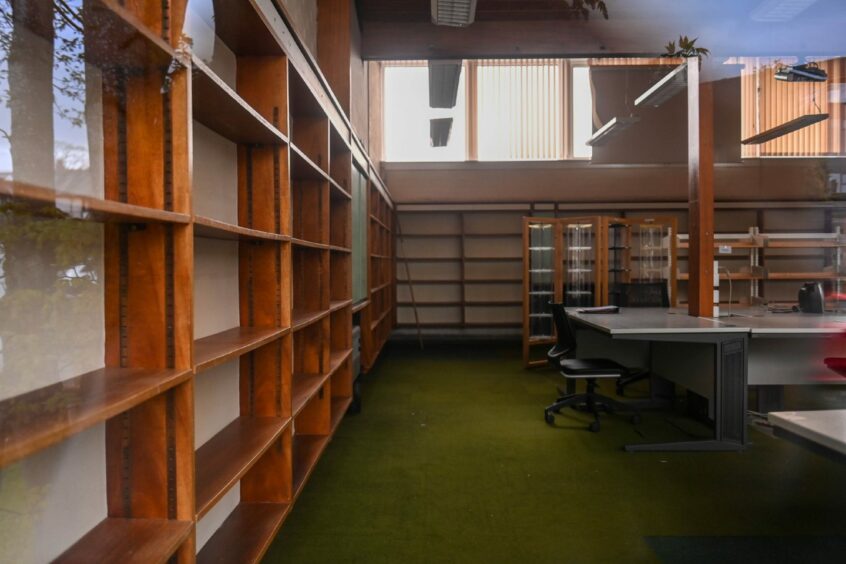 Cults Library was another among the six to close in Aberdeen. The shelves have been left bare as the council cleaned out the building. Image: Darrell Benns/DC Thomson.