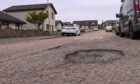 A pothole on a residential street in Peterhead.