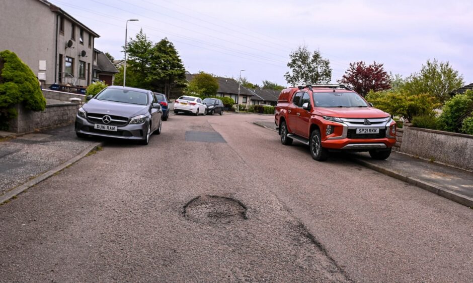 There are now four potholes in the Peterhead street. Image: Darrell Benns/ DC Thomson.