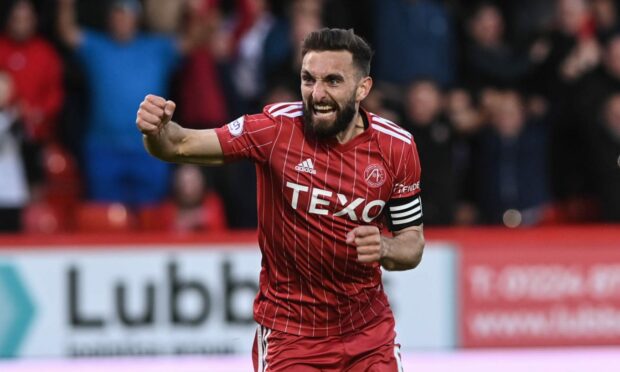 Graeme Shinnie punches the air in celebration for Aberdeen. Image: Darrell Benns/DC Thomson.