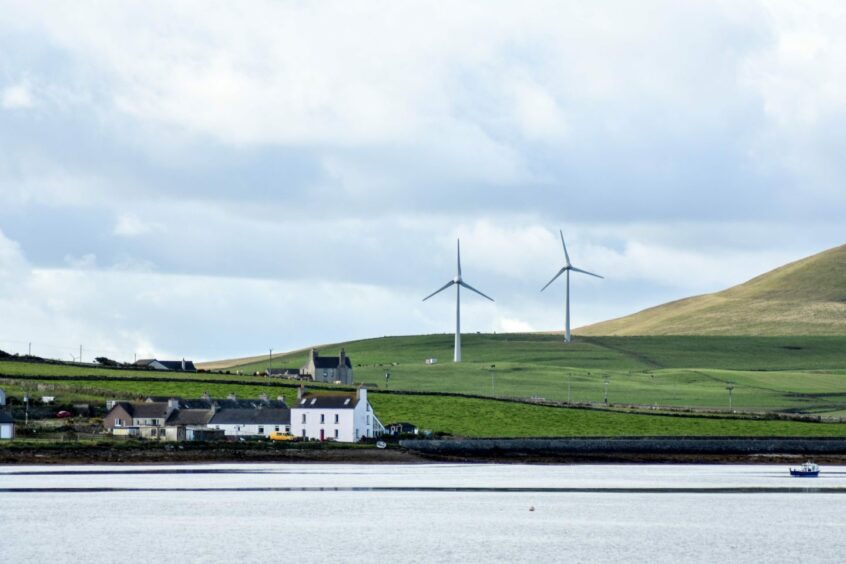 Two wind turbines that are community-owned but run by the Westray Development Trust. 