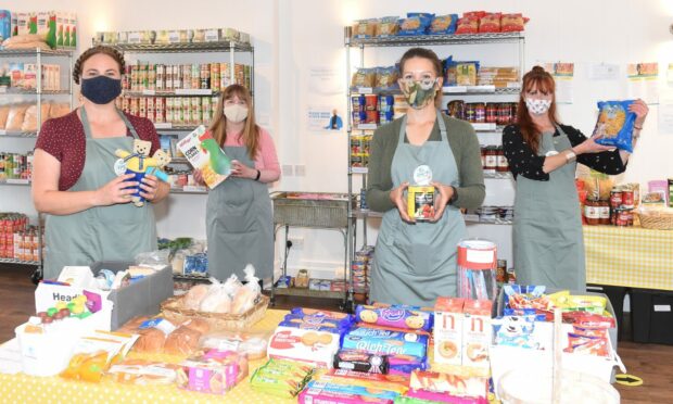 Volunteers photographed at The Haven community food larder in Stonehaven.