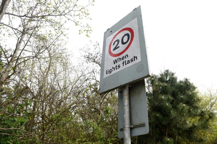 New flashing signs will be put in place to signal the traffic ban - similar to existing 20mph signs like this one. Image: Darrell Benns/DC Thomson.