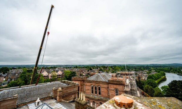 A crane towers above Inverness Castle in Inverness.