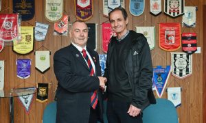 Frank McGettrick, right, with Lossiemouth chairman Alan McIntosh.