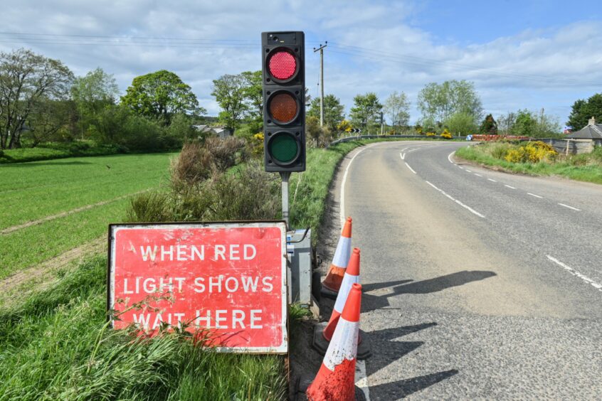 Traffic lights at Pittendreich bridge after it was damaged due to being hit by a lorry.