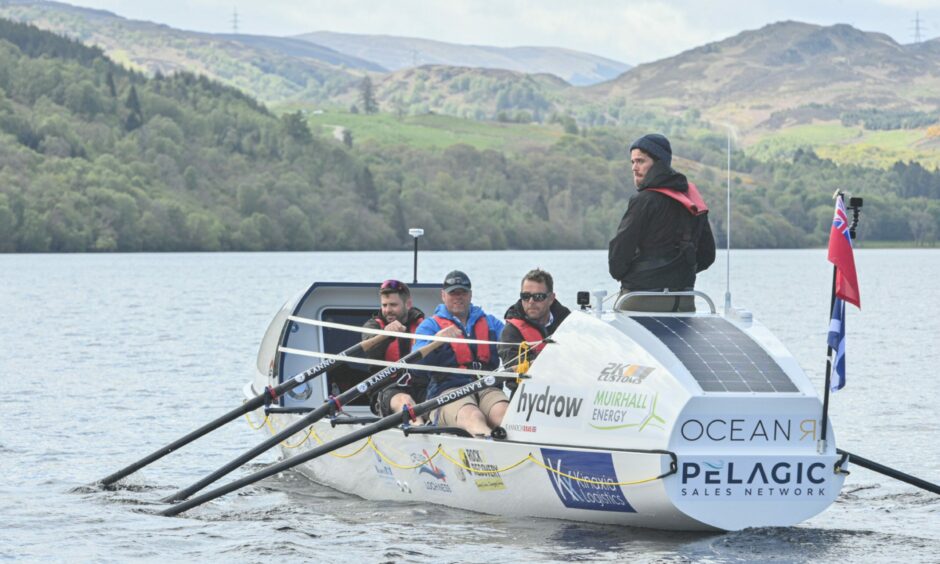 Team AtlanticR2R training by rowing across Loch Ness.