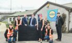 Picture shows Matt James solar installer, Alan Angus, Edmonson Electrical Elgin, Jamie Di Sotto, AES, Jenni Donnely, general manager, The Oxygen Works, Leigh-Ann Little, CEO The Oxygen Works, Jordan Steele AES supervisor and Andrew Macky, ANM Electrical. Image Jason Hedges/DC Thomson