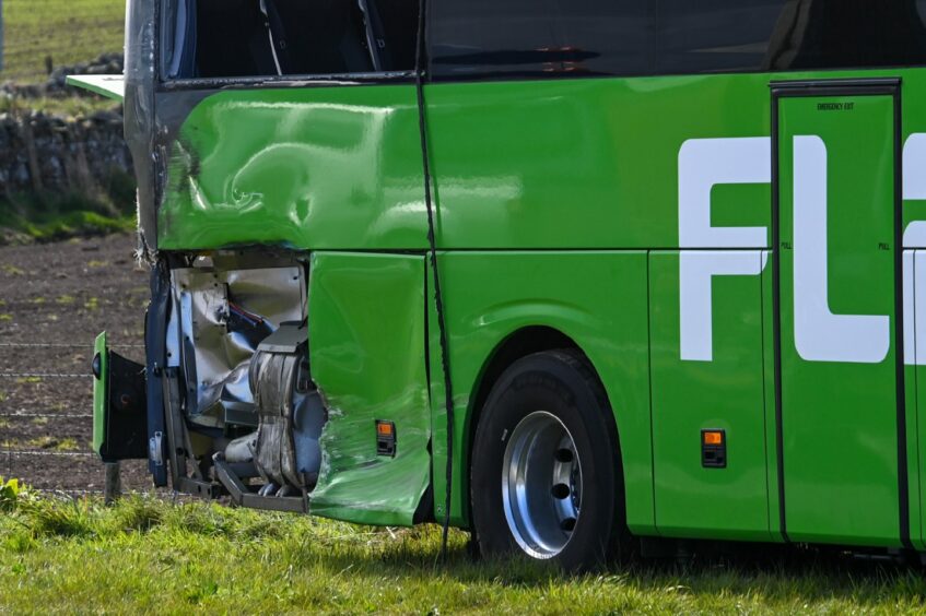The damage on the back of the bus involved on the crash
