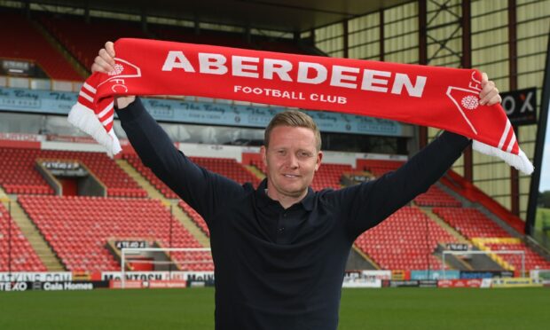 Aberdeen chairman Dave Cormack has hailed the job done by manager Barry Robson, pictured.