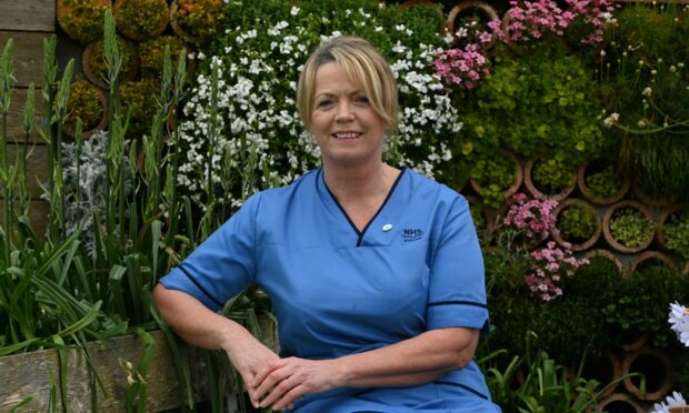 Pauline Keith, a nurse at Aberdeen Royal Infirmary, has been recognised for her skill and compassion by being nominated for a Daisy Award. Image: Kenny Elrick / DC Thomson.