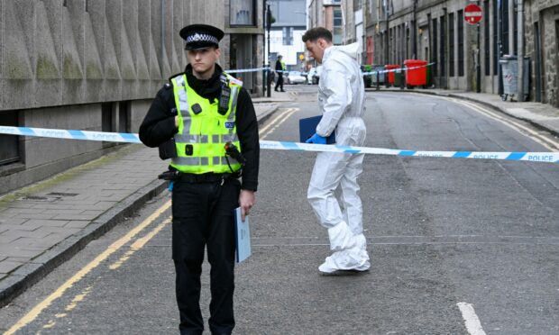 Police have taped off a section of Langstane Place. Image: Kenny Elrick/DC Thomson