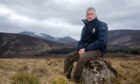 Balmoral Estate head ranger Glyn Jones at Loch Muick, with Lochnagar rising behind him