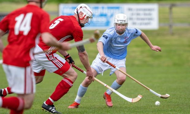 Camanachd Leodhais playing shinty. Picture from Facebook