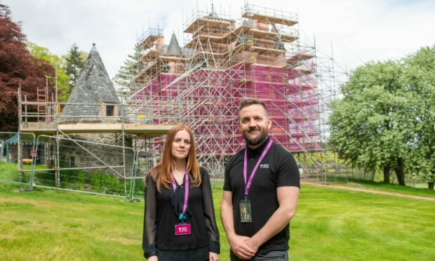 National Trust for Scotland building surveyor Annie Robertson and operations manager James Henderson have been showing how Craigievar Castle  remains pink. Image: Kami Thomson /DC Thomson.