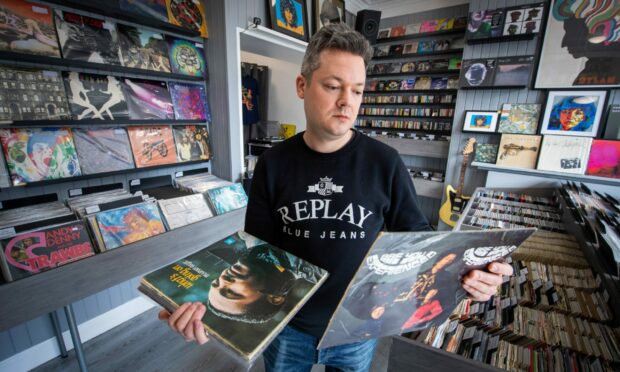 Reuben Clark has opened a new record shop in Fonthill Road called Goldstar Records. Image: Kami Thomson/DC Thomson