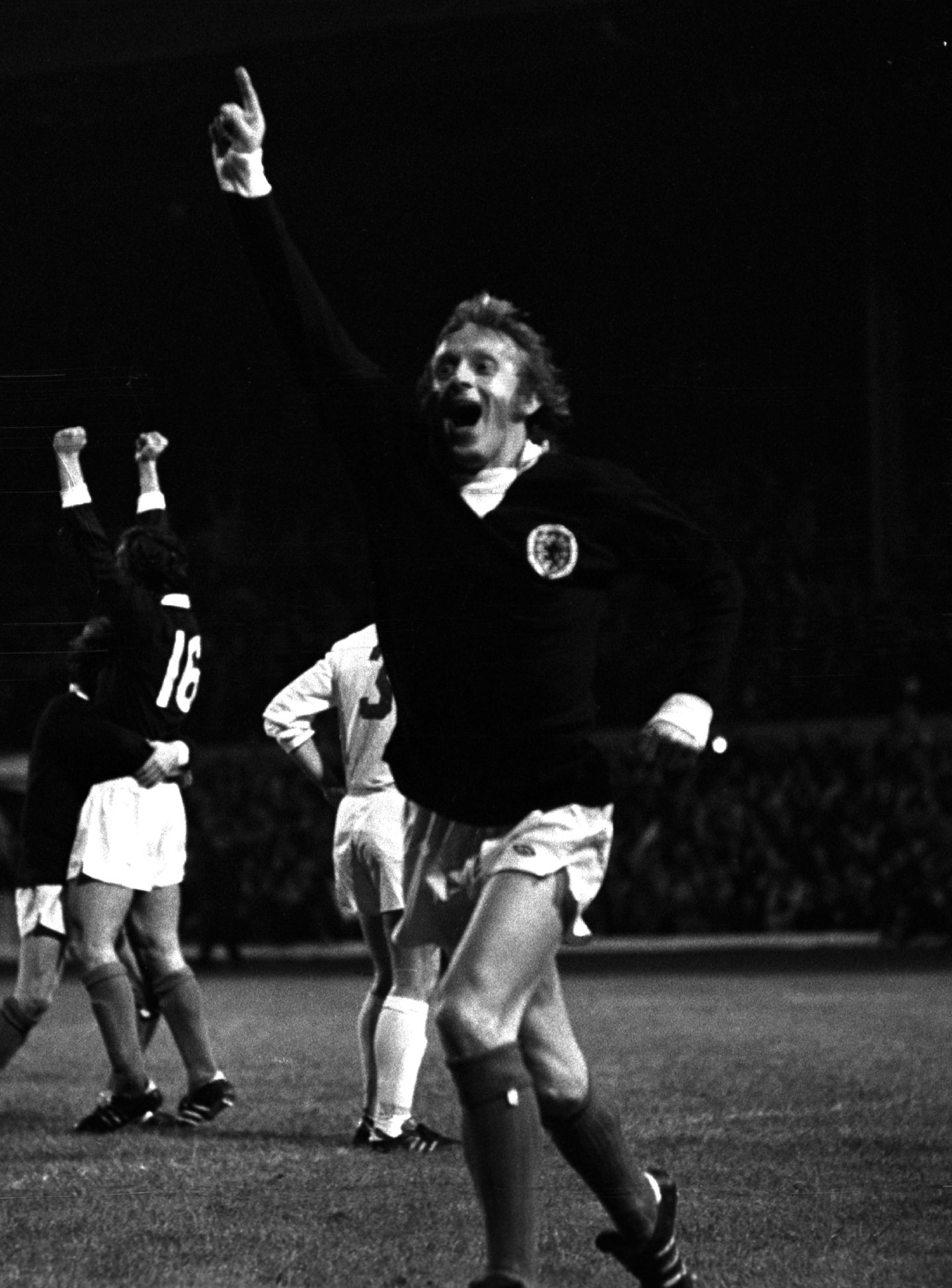 Denis Law playing for Scotland