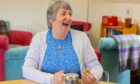 Dementia sufferer Maureen McClung laughing.