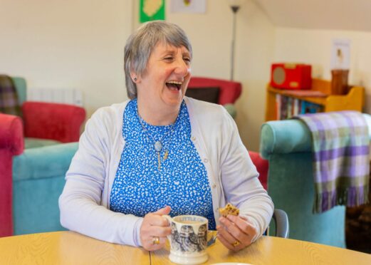 Dementia sufferer Maureen McClung laughing.