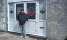 Mark Mackenzie stands outside of Legend Arcade, in the Plantation area of Fort William