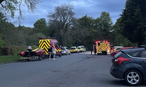 Emergency services at Ness Bank. Image: Ross Hempseed/DC Thomson.