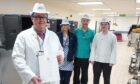 Left to right: Ruaraidh McKinnon, Caitlin Angus (cook), Steven Tait (team leader) and Bradley Gillespie (cook) in the production kitchen at Royal Cornhill Hospital. Image: NHS Grampian.