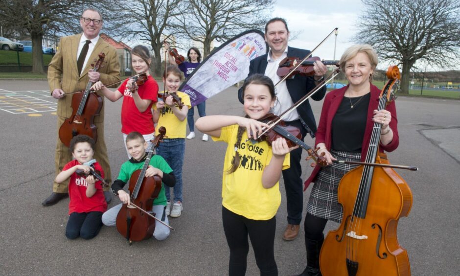 Council co-leaders Jenny Laing (right) and Douglas Lumsden (centre) met children from Big Noise Torry and Sistema Scotland chairman Benny Higgins in February 2020. Image: Norman Adams/Aberdeen City Council.