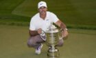 Brooks Koepka holds the Wanamaker trophy after winning the PGA Championship. Image: PA