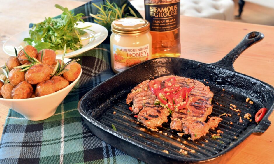 A selection of dishes from Eat on the Green with a jar of Aberdeenshire Honey and a bottle of The Famous Grouse